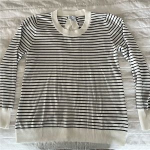 Eight 18 striped sweater with cute crisscross back detail.